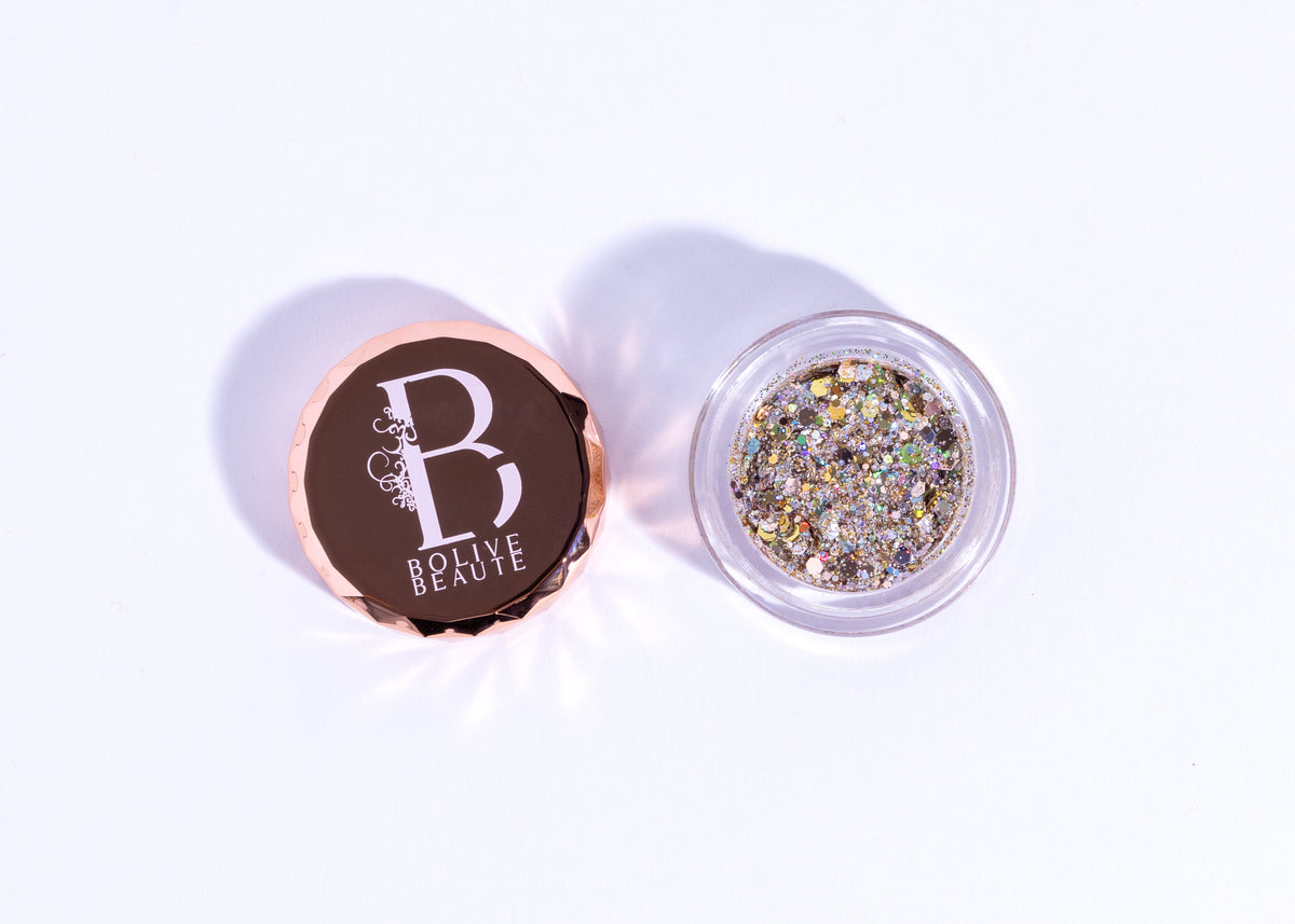 Moët champagne glitter eyeshadow with gold and silver flecks by Bolive Beauté