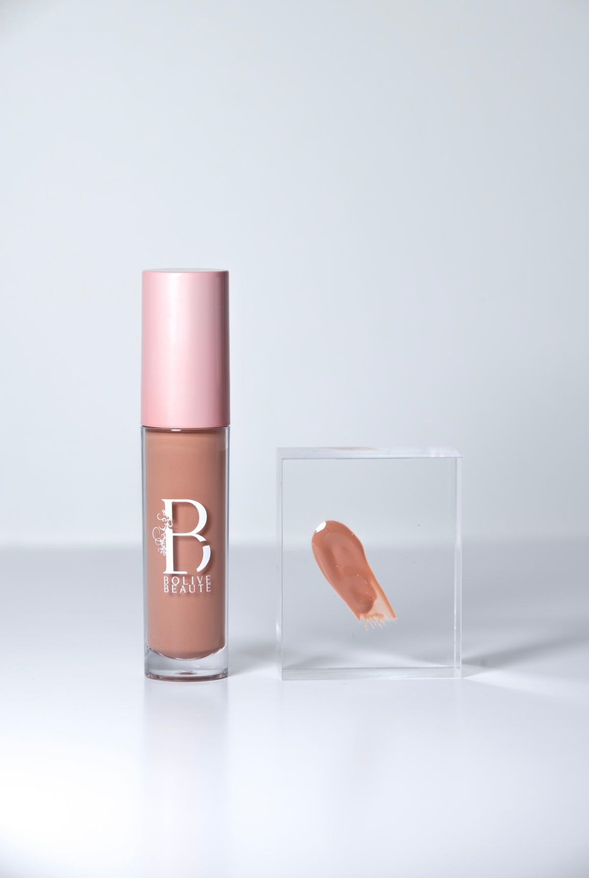 Aphrodisiac light toasty brown nude lip gloss by Bolive Beauté